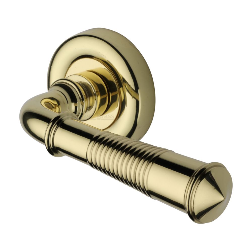 This is an image of a Heritage Brass - Door Handle Lever Latch on Round Rose Colonial Reeded Design Po, v1936-pb that is available to order from T.H Wiggans Ironmongery in Kendal.