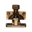 This is an image of a Heritage Brass - Brighton Sash Fastener Antique Brass Finish, v2055-at that is available to order from T.H Wiggans Ironmongery in Kendal.