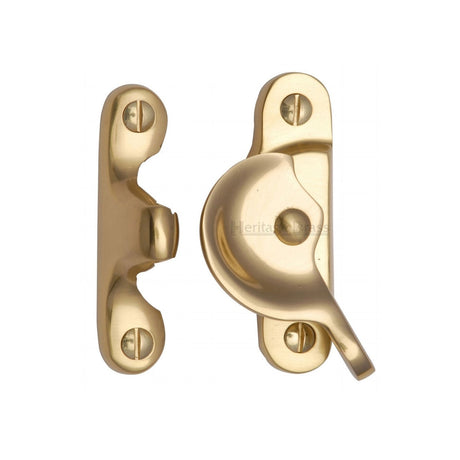 This is an image of a Heritage Brass - Fitch Pattern Sash Fastener Unlacquered Brass finish, v2060-ulb that is available to order from T.H Wiggans Ironmongery in Kendal.