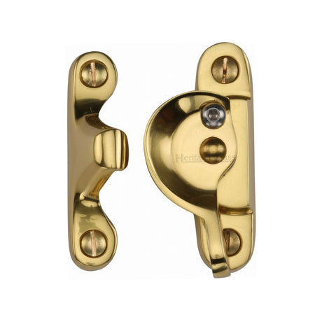 This is an image of a Heritage Brass - Fitch Pattern Sash Fastener Lockable Unlacquered Brass Finish, v2060l-ulb that is available to order from T.H Wiggans Ironmongery in Kendal.