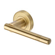 This is an image of a Heritage Brass - Door Handle Lever Latch on Round Rose Alicia Design Satin Brass, v2100-sb that is available to order from T.H Wiggans Ironmongery in Kendal.