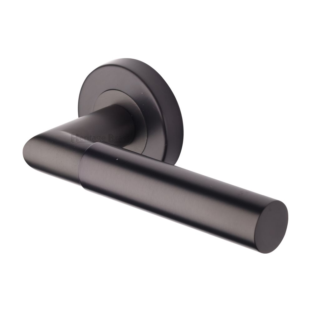 This is an image of a Heritage Brass - Door Handle Lever Latch on Round Rose Bauhaus Mitre Design Matt, v2270-mb that is available to order from T.H Wiggans Ironmongery in Kendal.