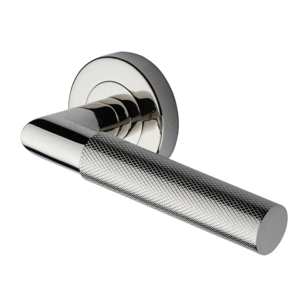 This is an image of a Heritage Brass - Door Handle Lever Latch on Round Rose Bauhaus Mitre Knurled Des, v2272-pnf that is available to order from T.H Wiggans Ironmongery in Kendal.