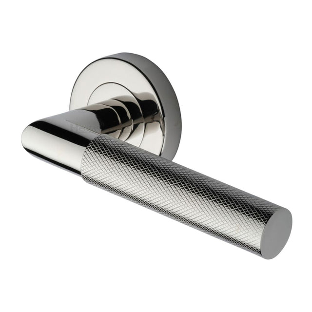 This is an image of a Heritage Brass - Door Handle Lever Latch on Round Rose Bauhaus Mitre Knurled Des, v2272-pnf that is available to order from T.H Wiggans Ironmongery in Kendal.