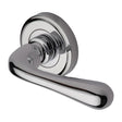 This is an image of a Heritage Brass - Door Handle Lever Latch on Round Rose Charlbury Design Polished Chr, v3020-pc that is available to order from T.H Wiggans Ironmongery in Kendal.