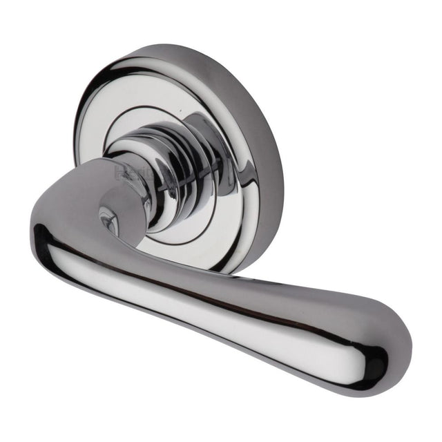 This is an image of a Heritage Brass - Door Handle Lever Latch on Round Rose Charlbury Design Polished Chr, v3020-pc that is available to order from T.H Wiggans Ironmongery in Kendal.
