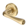 This is an image of a Heritage Brass - Door Handle Lever Latch on Round Rose Charlbury Design Satin Bra, v3020-sb that is available to order from T.H Wiggans Ironmongery in Kendal.