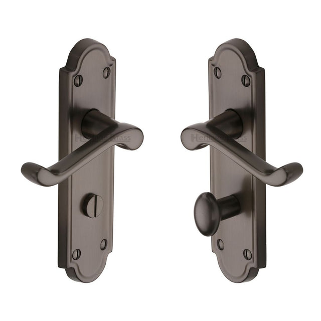 This is an image of a Heritage Brass - Door Handle Bathroom Set Meridian Design Matt Bronze Finish, v330-mb that is available to order from T.H Wiggans Ironmongery in Kendal.