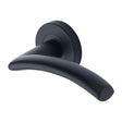 This is an image of a Heritage Brass - Door Handle Lever Latch on Round Rose Centaur Design Matt Black, v3490-bkmt that is available to order from T.H Wiggans Ironmongery in Kendal.