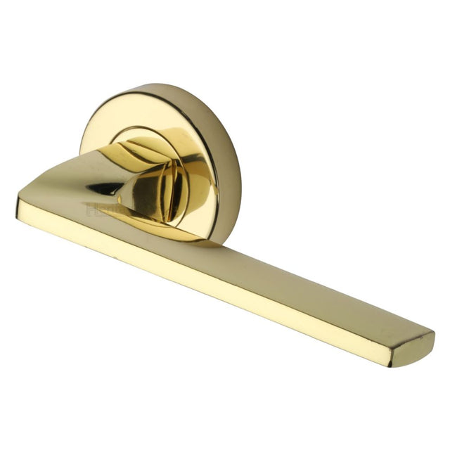 This is an image of a Heritage Brass - Door Handle Lever Latch on Round Rose Metro Angled Design Polished, v3790-pb that is available to order from T.H Wiggans Ironmongery in Kendal.