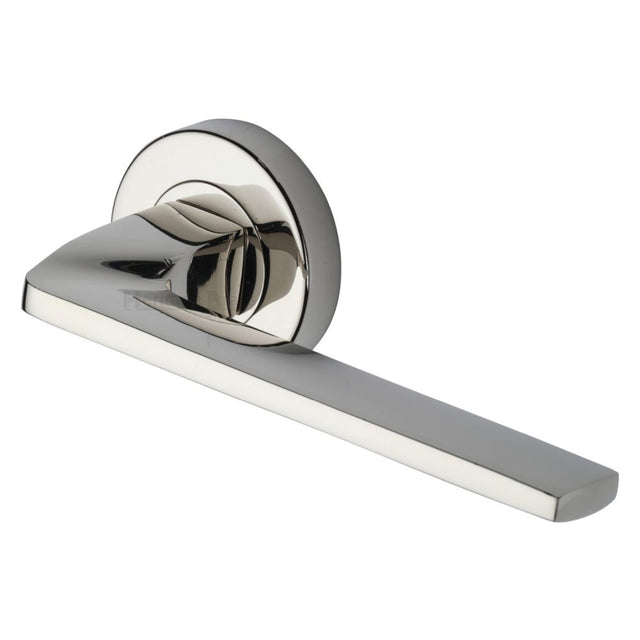 This is an image of a Heritage Brass - Door Handle Lever Latch on Round Rose Metro Angled Design Polished, v3790-pnf that is available to order from T.H Wiggans Ironmongery in Kendal.