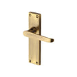 This is an image of a Heritage Brass - Door Handle Lever Latch Victoria Design Antique Brass Finish, v3913-at that is available to order from T.H Wiggans Ironmongery in Kendal.
