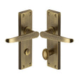 This is an image of a Heritage Brass - Door Handle for Bathroom Victoria Design Antique Brass Finish, v3930-at that is available to order from T.H Wiggans Ironmongery in Kendal.