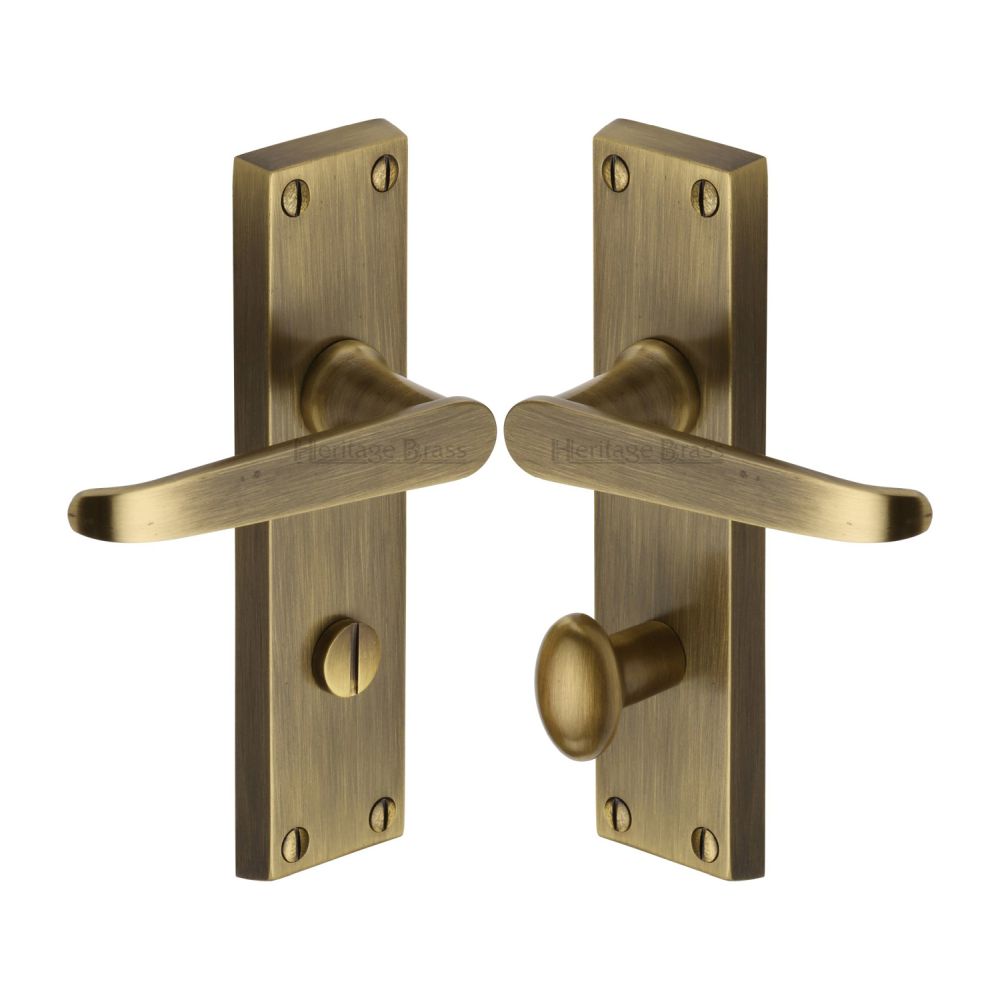 This is an image of a Heritage Brass - Door Handle for Bathroom Victoria Design Antique Brass Finish, v3930-at that is available to order from T.H Wiggans Ironmongery in Kendal.