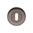 This is an image of a Heritage Brass - Key Escutcheon Matt Bronze Finish, v4000-mb that is available to order from T.H Wiggans Ironmongery in Kendal.