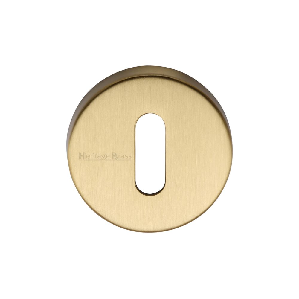 This is an image of a Heritage Brass - Key Escutcheon Satin Brass Finish, v4007-sb that is available to order from T.H Wiggans Ironmongery in Kendal.