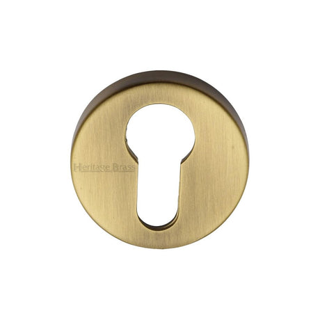 This is an image of a Heritage Brass - Euro Profile Cylinder Escutcheon Antique Brass Finish, v4008-at that is available to order from T.H Wiggans Ironmongery in Kendal.