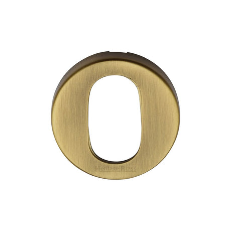 This is an image of a Heritage Brass - Oval Profile Cylinder Escutcheon Antique Brass Finish, v4009-at that is available to order from T.H Wiggans Ironmongery in Kendal.