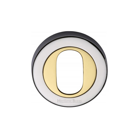 This is an image of a Heritage Brass - Oval Profile Cylinder Escutcheon Chrome & Brass Finish, v4010-cb that is available to order from T.H Wiggans Ironmongery in Kendal.