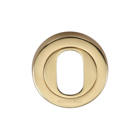 This is an image of a Heritage Brass - Oval Profile Cylinder Escutcheon Polished Brass Finish, v4010-pb that is available to order from T.H Wiggans Ironmongery in Kendal.