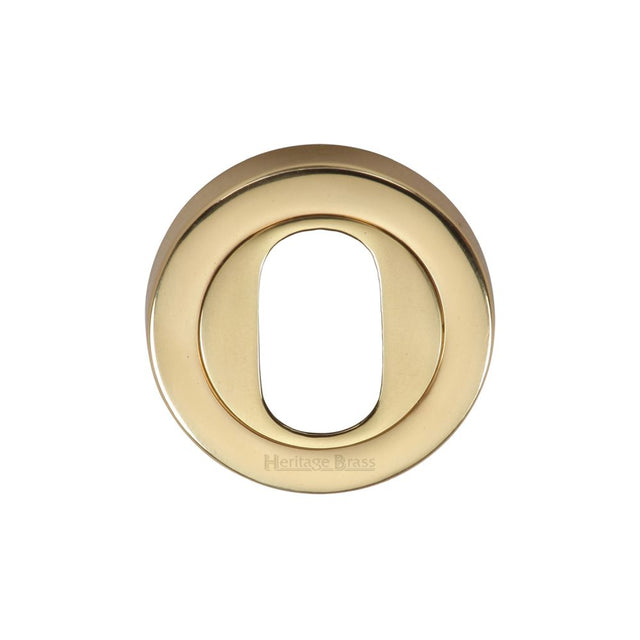 This is an image of a Heritage Brass - Oval Profile Cylinder Escutcheon Polished Brass Finish, v4010-pb that is available to order from T.H Wiggans Ironmongery in Kendal.