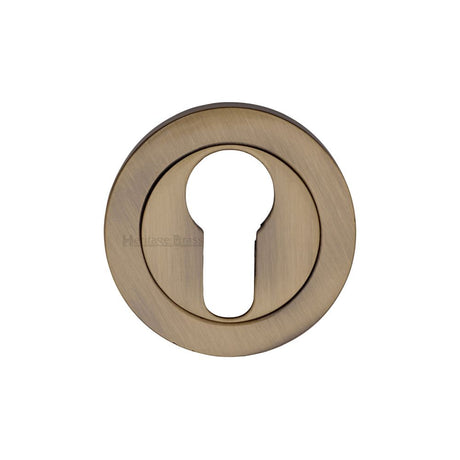 This is an image of a Heritage Brass - Euro Profile Cylinder Escutcheon Antique Brass Finish, v4020-at that is available to order from T.H Wiggans Ironmongery in Kendal.