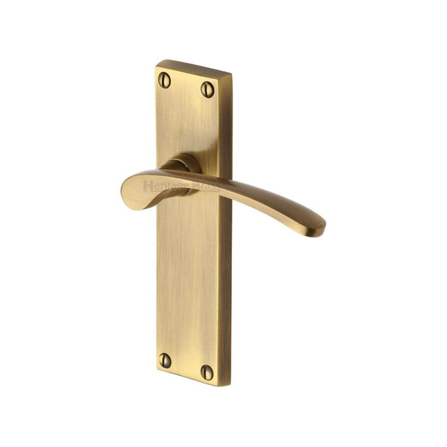 This is an image of a Heritage Brass - Door Handle Lever Latch Sophia Design Antique Brass Finish, v4113-at that is available to order from T.H Wiggans Ironmongery in Kendal.