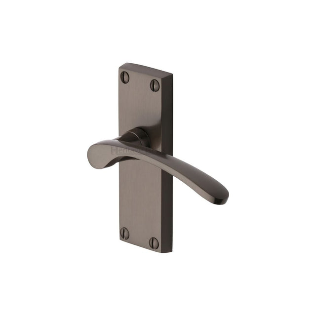 This is an image of a Heritage Brass - Door Handle Lever Latch Sophia Short Design Matt Bronze Finish, v4140-mb that is available to order from T.H Wiggans Ironmongery in Kendal.