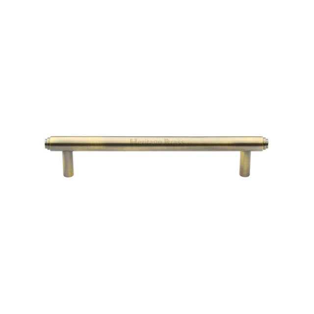 This is an image of a Heritage Brass - Cabinet Pull Stepped Design 128mm CTC Antique Brass Finish, v4410-128-at that is available to order from T.H Wiggans Ironmongery in Kendal.