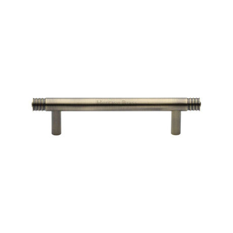 This is an image of a Heritage Brass - Cabinet Pull Contour Design 96mm CTC Antique Brass Finish, v4446-96-at that is available to order from T.H Wiggans Ironmongery in Kendal.
