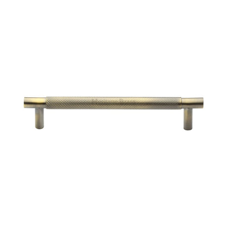 This is an image of a Heritage Brass - Cabinet Pull Partial Knurled Design 128mm CTC Antique Brass Finish, v4461-128-at that is available to order from T.H Wiggans Ironmongery in Kendal.