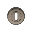 This is an image of a Heritage Brass - Key Escutcheon Matt Bronze Finish, v5000-mb that is available to order from T.H Wiggans Ironmongery in Kendal.