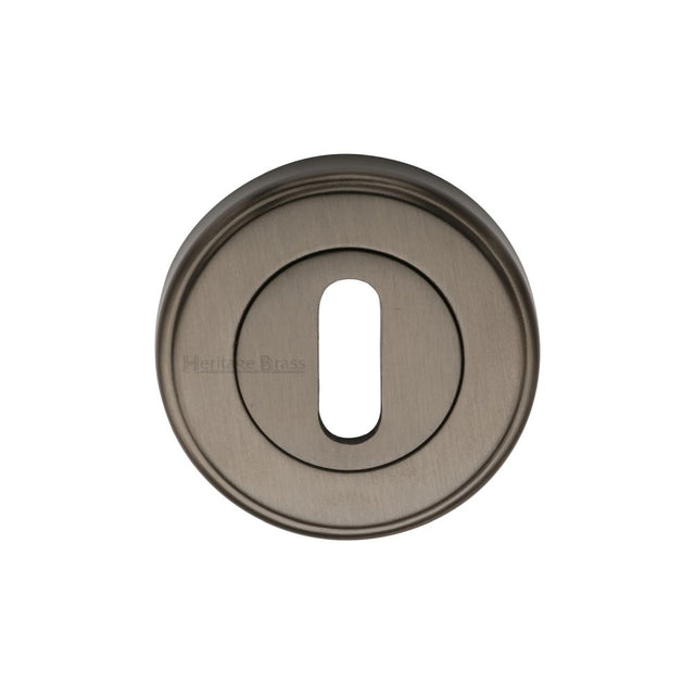 This is an image of a Heritage Brass - Key Escutcheon Matt Bronze Finish, v5000-mb that is available to order from T.H Wiggans Ironmongery in Kendal.