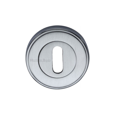 This is an image of a Heritage Brass - Key Escutcheon Satin Chrome Finish, v5000-sc that is available to order from T.H Wiggans Ironmongery in Kendal.