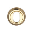 This is an image of a Heritage Brass - Oval Profile Cylinder Escutcheon Polished Brass Finish, v5010-pb that is available to order from T.H Wiggans Ironmongery in Kendal.