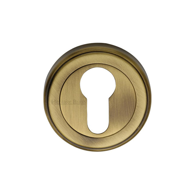 This is an image of a Heritage Brass - Euro Profile Cylinder Escutcheon Antique Brass Finish, v5020-at that is available to order from T.H Wiggans Ironmongery in Kendal.