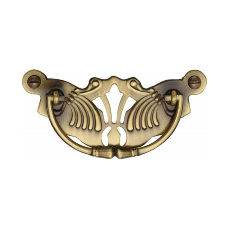 This is an image of a Heritage Brass - Cabinet Pull Ornate Plate Design Antique Brass Finish, v5021-at that is available to order from T.H Wiggans Ironmongery in Kendal.
