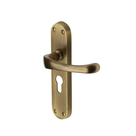 This is an image of a Heritage Brass - Door Handle for Euro Profile Plate Gloucester Design Antique Brass, v6066-48-at that is available to order from T.H Wiggans Ironmongery in Kendal.