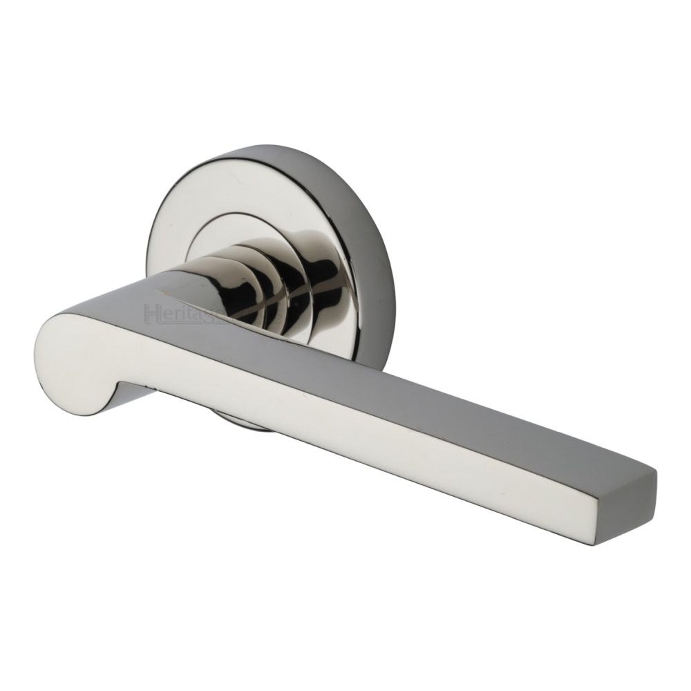 This is an image of a Heritage Brass - Door Handle Lever Latch on Round Rose Metro Mid Century Design, v6225-pnf that is available to order from T.H Wiggans Ironmongery in Kendal.