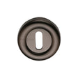 This is an image of a Heritage Brass - Key Escutcheon Matt Bronze Finish, v6722-mb that is available to order from T.H Wiggans Ironmongery in Kendal.