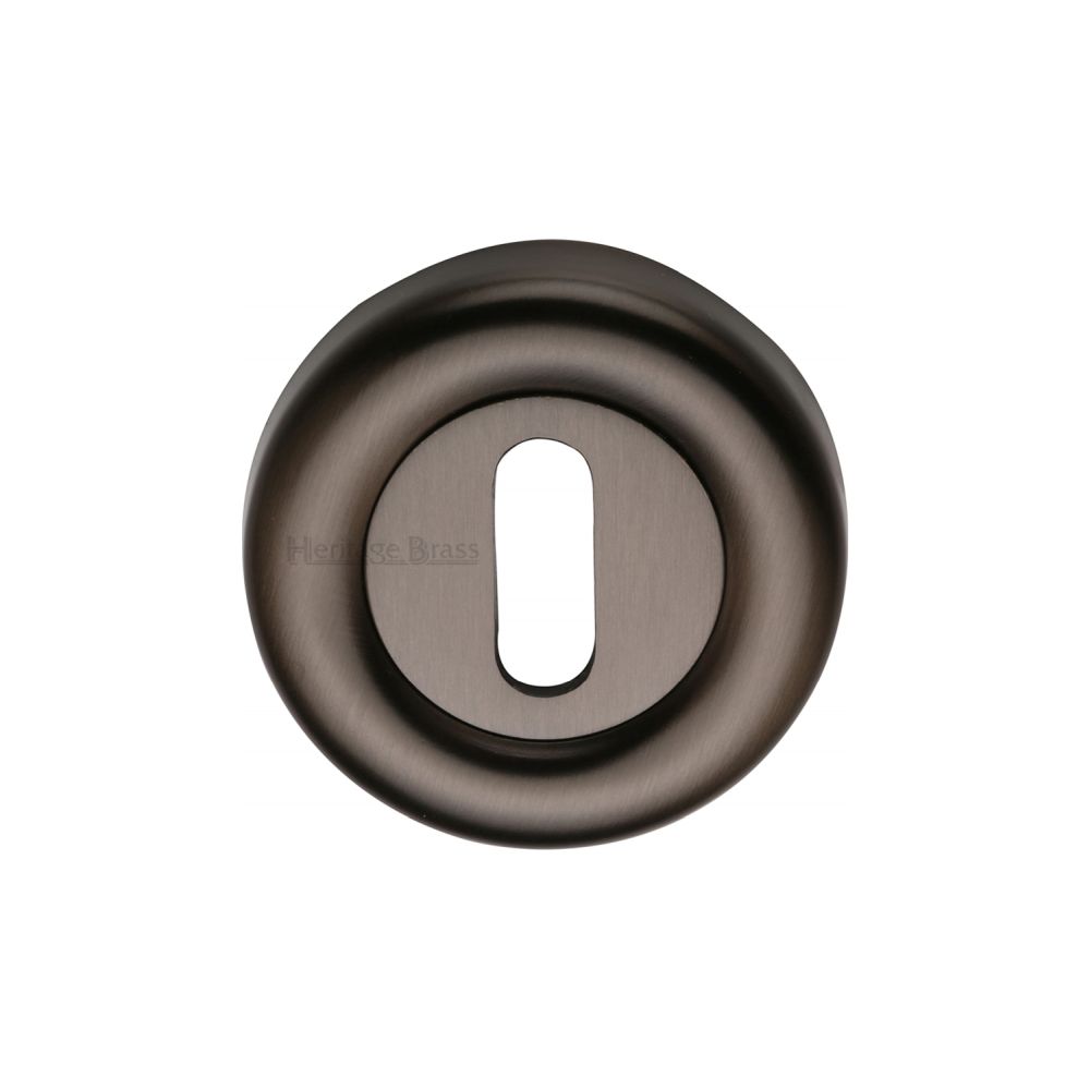 This is an image of a Heritage Brass - Key Escutcheon Matt Bronze Finish, v6722-mb that is available to order from T.H Wiggans Ironmongery in Kendal.