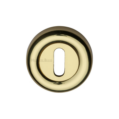 This is an image of a Heritage Brass - Key Escutcheon Polished Brass Finish, v6722-pb that is available to order from T.H Wiggans Ironmongery in Kendal.