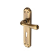 This is an image of a Heritage Brass - Door Handle Lever Lock Charlbury Design Antique Brass Finish, v7050-at that is available to order from T.H Wiggans Ironmongery in Kendal.