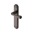 This is an image of a Heritage Brass - Door Handle Lever Latch Charlbury Design Matt Bronze Finish, v7060-mb that is available to order from T.H Wiggans Ironmongery in Kendal.