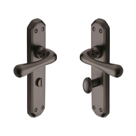This is an image of a Heritage Brass - Door Handle Bathroom Set Charlbury Design Matt Bronze Finish, v7070-mb that is available to order from T.H Wiggans Ironmongery in Kendal.