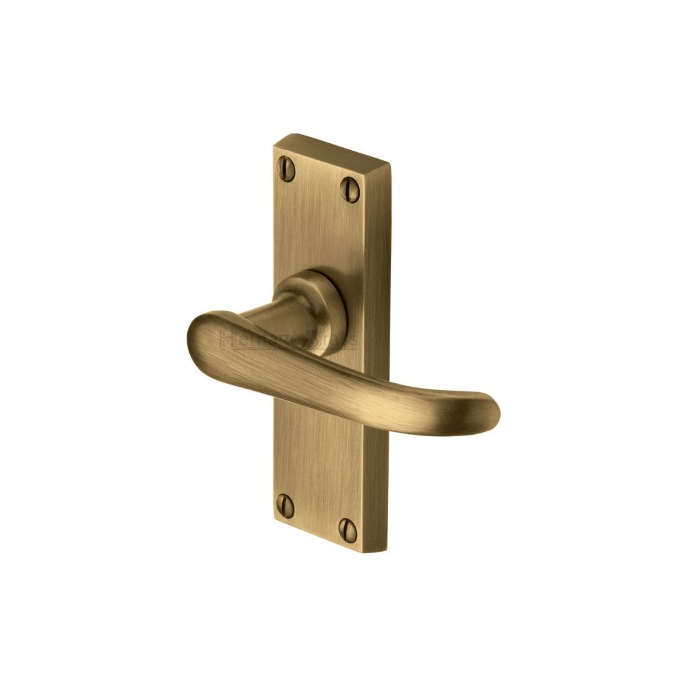 This is an image of a Heritage Brass - Door Handle Lever Latch Windsor Short Design Antique Brass Finish, v710-at that is available to order from T.H Wiggans Ironmongery in Kendal.