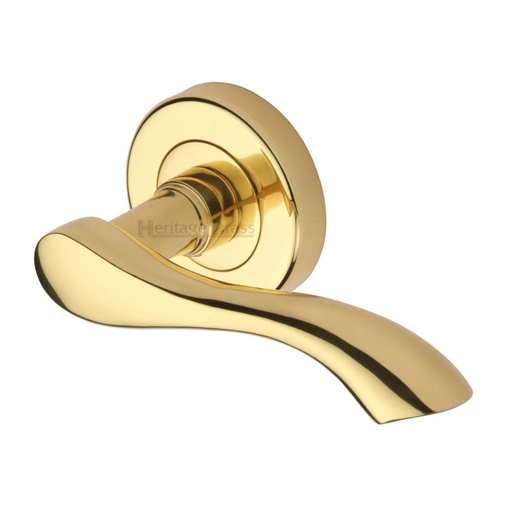 This is an image of a Heritage Brass - Door Handle Lever Latch on Round Rose Algarve Design Polished Brass, v7210-pb that is available to order from T.H Wiggans Ironmongery in Kendal.