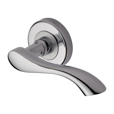 This is an image of a Heritage Brass - Door Handle Lever Latch on Round Rose Algarve Design Polished Chrom, v7210-pc that is available to order from T.H Wiggans Ironmongery in Kendal.