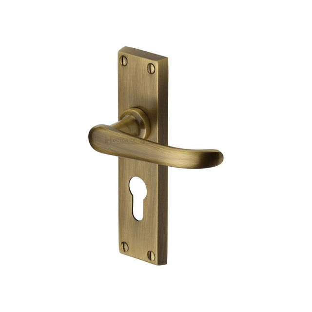 This is an image of a Heritage Brass - Door Handle for Euro Profile Plate Windsor Design Antique Brass Fi, v727-48-at that is available to order from T.H Wiggans Ironmongery in Kendal.