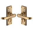 This is an image of a Heritage Brass - Door Handle for Privacy Set Windsor Short Design Antique Brass Fin, v735-at that is available to order from T.H Wiggans Ironmongery in Kendal.
